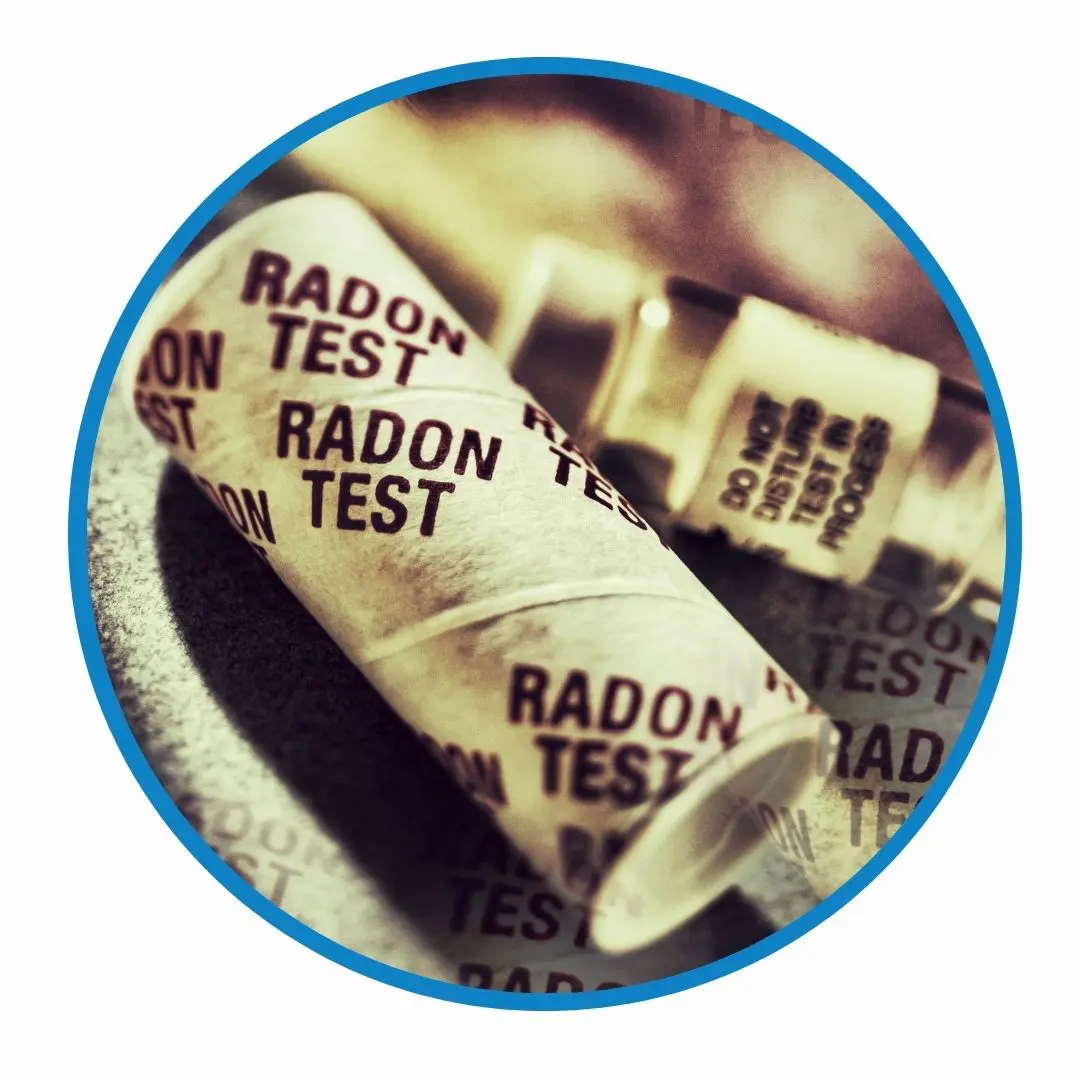 Radon test kits with printed labels, emphasizing environmental safety and testing services by EnviroPro 360.