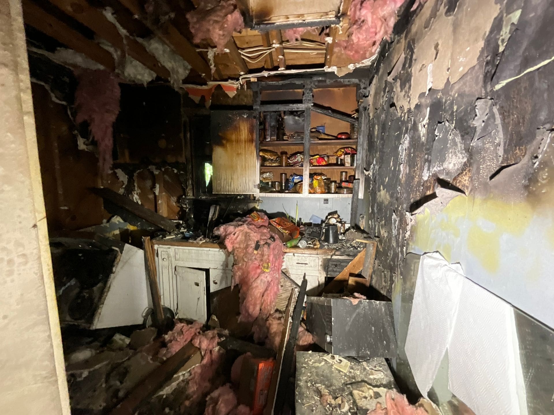 Damaged home with repairs on hold pending asbestos testing by EnviroPro 360