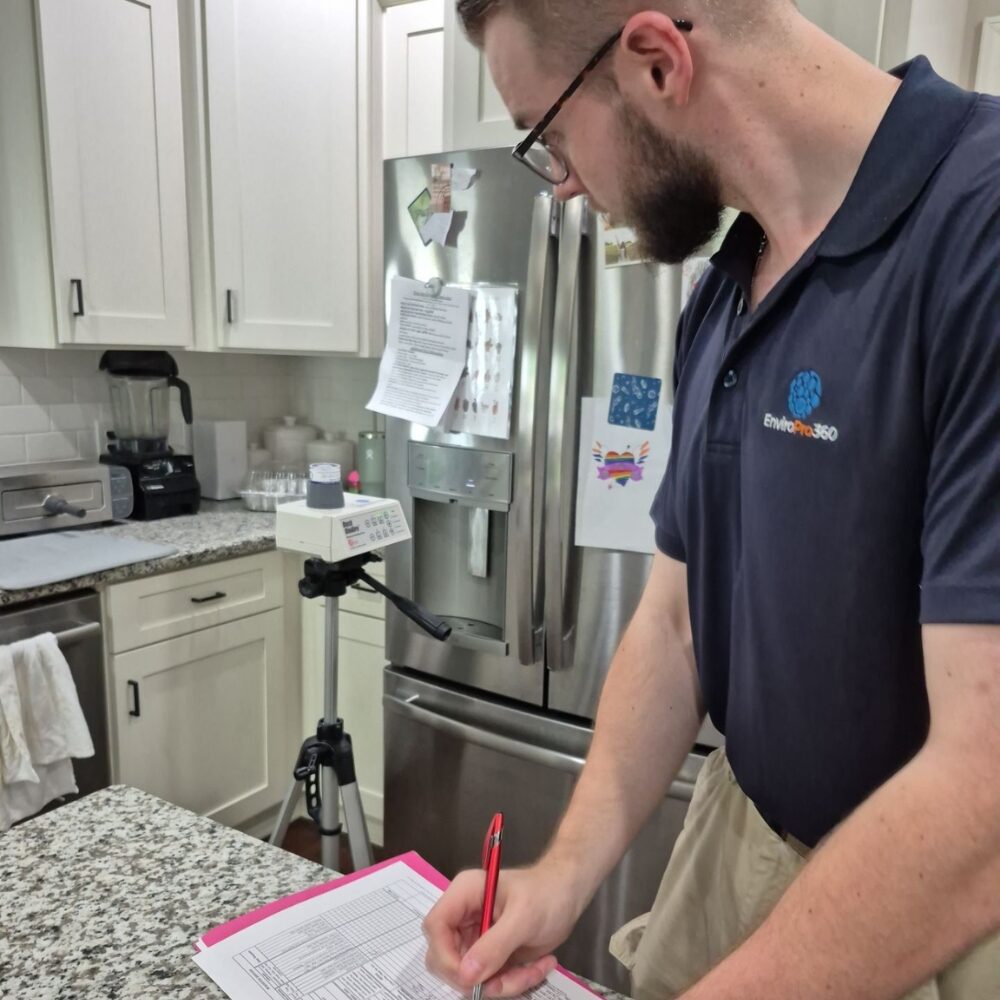 Matthew Galpin, Inspector for EnviroPro 360 Checks a Home for Mold.