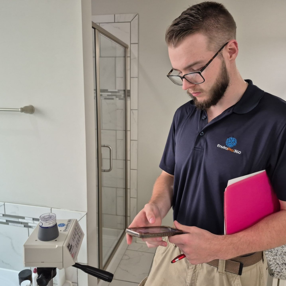 EnviroPro 360 inspector taking a mold cartridge from a bathroom in Aiken that had a possible mold problem.